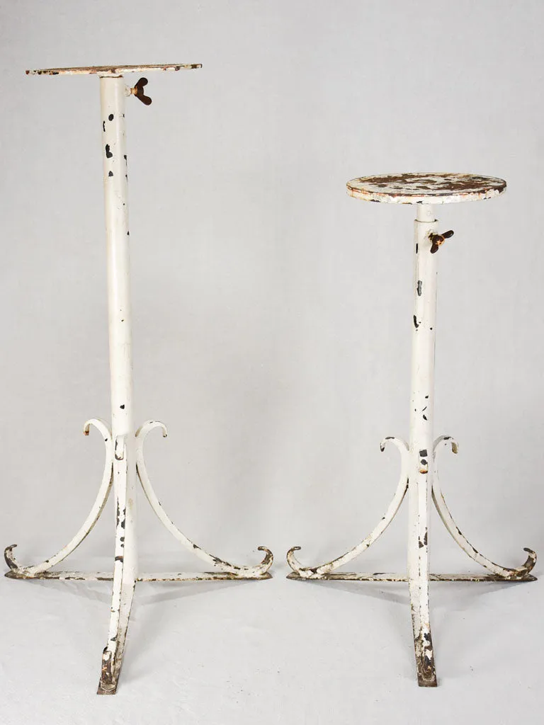 Two adjustable iron pot plant stands - early 20th century